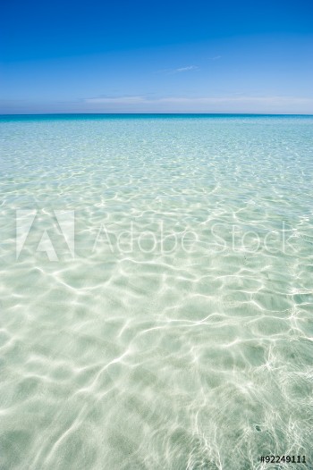 Picture of Shore of classic turquoise Caribbean Sea dream beach under bright blue sky near the resort town of Varadero Cuba